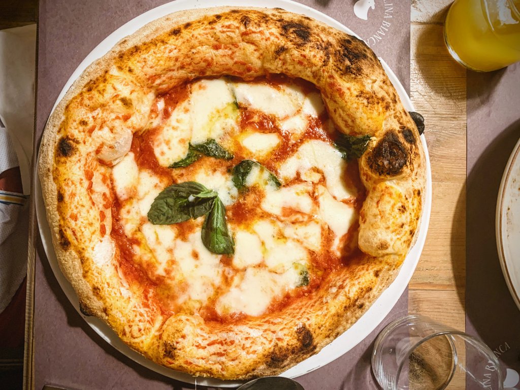 Pizza at La Gallina Bianca in Seville, Spain.