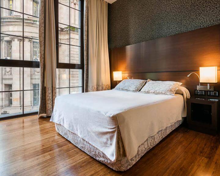 Queen bedroom at barcelona hotel colonial